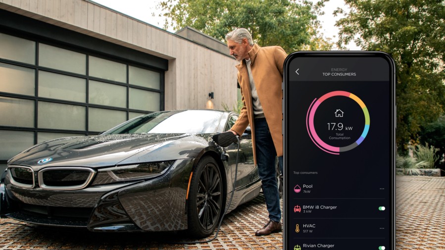 A man charging an electric vehicle. Overlayed is a smart phone displaying the Savant App with the Savant Power System.